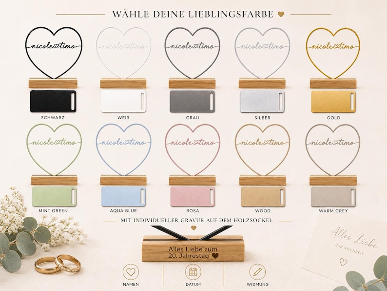 May include: A collection of ten heart-shaped wire ornaments in various colors, each mounted on a wooden base. The hearts feature the text nicole timo. Below, a wooden base displays the engraved text Alles Liebe zum 20. Jahrestag with a heart icon.