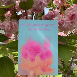 May include: A light blue card with pink watercolor splatter and the text "Ich lasse Dinge los, die nicht gut f&uuml;r mich sind."