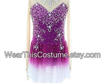 May include: A purple and white figure skating dress with long sleeves and a high neckline. The dress is decorated with rhinestones and has a gradient skirt.