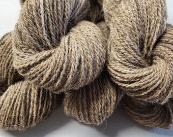 Natural undyed rough sheep wool yarn for rug making, tapestry and crafts