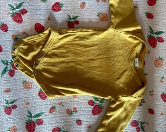 long sleeve yellow baby onesie size 3 to 6 months. good condition, preloved