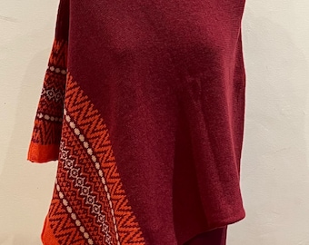 Merino Lambswool Knitted Poncho with zigzag fairisle border. Shorter length.