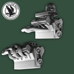 May include: Two grey engine models with exhaust pipes and pulleys are shown against a dark green background. One engine has a skull on top. The Falcon Nest logo is in the upper left corner.