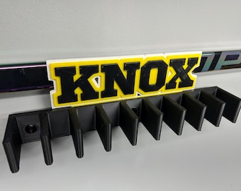 Soporte para palos de hockey: Organizador de pared para 9 palos, almacenamiento de equipo personalizable.