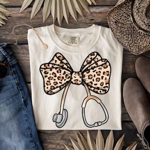 Cheetah Print Stethoscope Bow Comfort Colors T, Nurse Doctor Unisex Shirt, Medical Apparel, Veterinary Clinic Tee, Healthcare Worker Gift,