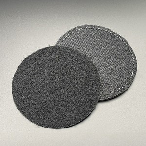 May include: Two black round velcro patches, one with a fuzzy surface and the other with a smooth surface.