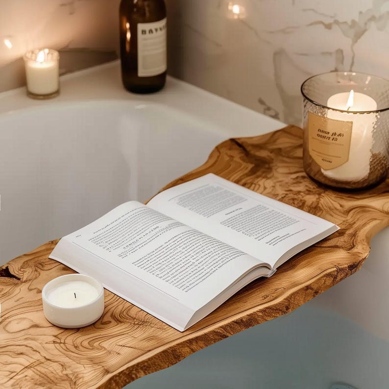 Luxurious wooden bath tray made from olive wood, featuring a free-form edge and ample space for your spa essentials. This bath caddy blends functionality with natural beauty, elevating your bath decor.