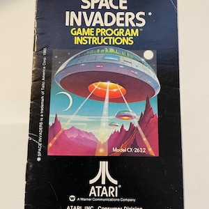 Authentieke Space Invaders (Atari)-videogamehandleiding