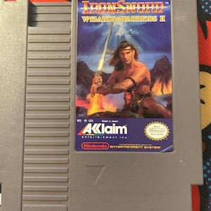 Authentieke Nintendo 'nes' Iron Sword-gamewagen.