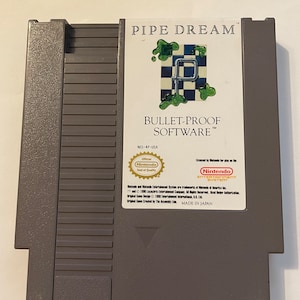 Authentieke Nintendo 'nes' Pipe Dream-gamewagen.