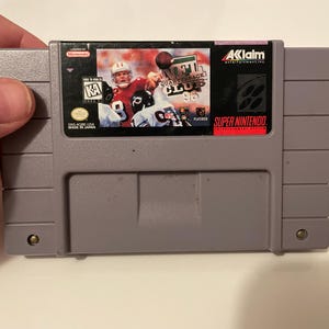 Authentieke Super Nintendo NFL Quarterback Club 96-wagen