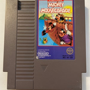 Authentieke Nintendo 'nes' Mickey Mousecapade-gamewagen.