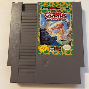 Authentieke Nintendo "nes" Cobra Command-gamewagen.