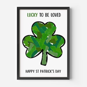 Peut inclure: Une affiche encadrée avec un trèfle vert. Le trèfle est rempli de différentes nuances de vert et souligné en noir. Le texte "LUCKY TO BE LOVED" et "HAPPY ST PATRICK'S DAY" est affiché en vert et noir.