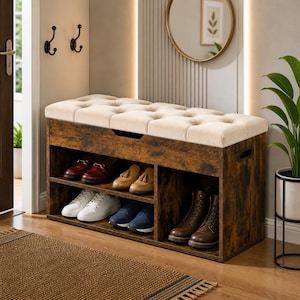 May include: A rectangular shoe storage bench with a dark brown wood-grain finish and a tufted beige upholstered seat. The unit features two open shelves for footwear, with a divided section on the right side, and integrated side handles.