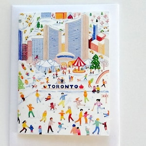 Puede incluir: Una tarjeta de felicitación con una escena invernal en Toronto. La ilustración muestra a personas patinando sobre hielo, jugando al hockey y disfrutando de un festival de invierno. La palabra "TORONTO" se muestra de forma destacada. También se ven edificios y un tiovivo.