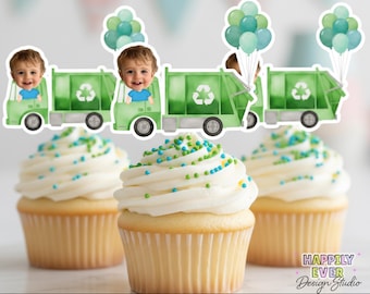 May include: Cupcakes with white frosting and colorful sprinkles, decorated with green recycling truck toppers and balloons. The toppers feature a child's face. Text reads "PERSONALIZED CUPCAKE TOPPERS DIGITAL FILE".