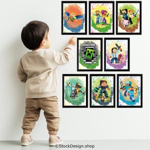 May include: A collection of seven framed Minecraft-themed art prints. Each print features colorful characters and scenes from the popular video game. The prints are displayed on a white wall, with a child in the foreground.