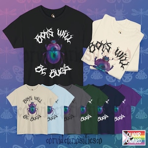 May include: A white ceramic mug with a black handle and the text "But First, Coffee" in a black, bold font. The mug is on a white surface.