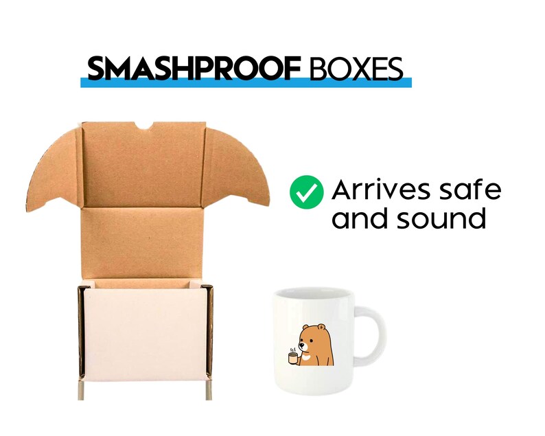 May include: A brown cardboard box with a white interior and a checkmark next to the text "Arrives safe and sound". A white ceramic mug with a brown bear illustration is shown in front of the box.