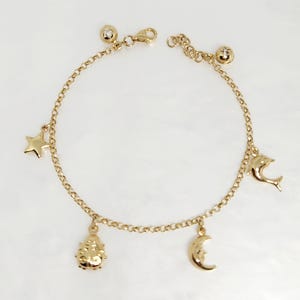 10K Yellow Gold Charm Bracelet, Gold Rolo Link Bracelet; Gold Ball Charm, Gold Moon Charm, Dolphin Charm, Star Charm, Ladybug Charm, 7.25&quot;
