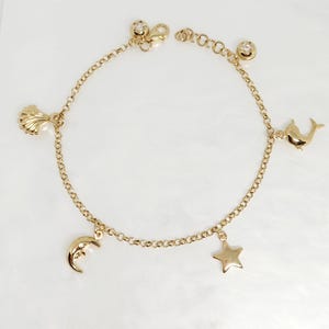 10K Yellow Gold Charm Bracelet, Gold Rolo Link Bracelet; Gold Ball Charm, Gold Seashell Charm, Moon Charm, Dolphin Charm, Star Charm, 7.25&quot;