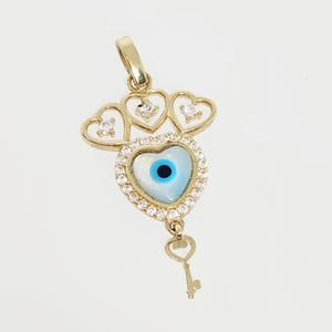 14K żółte złoto urok złego oka, urok szczęścia, urok dobrego losu, urok złotego serca, biżuteria ochronna złota, prezent walentynkowy, 25 x 15 mm