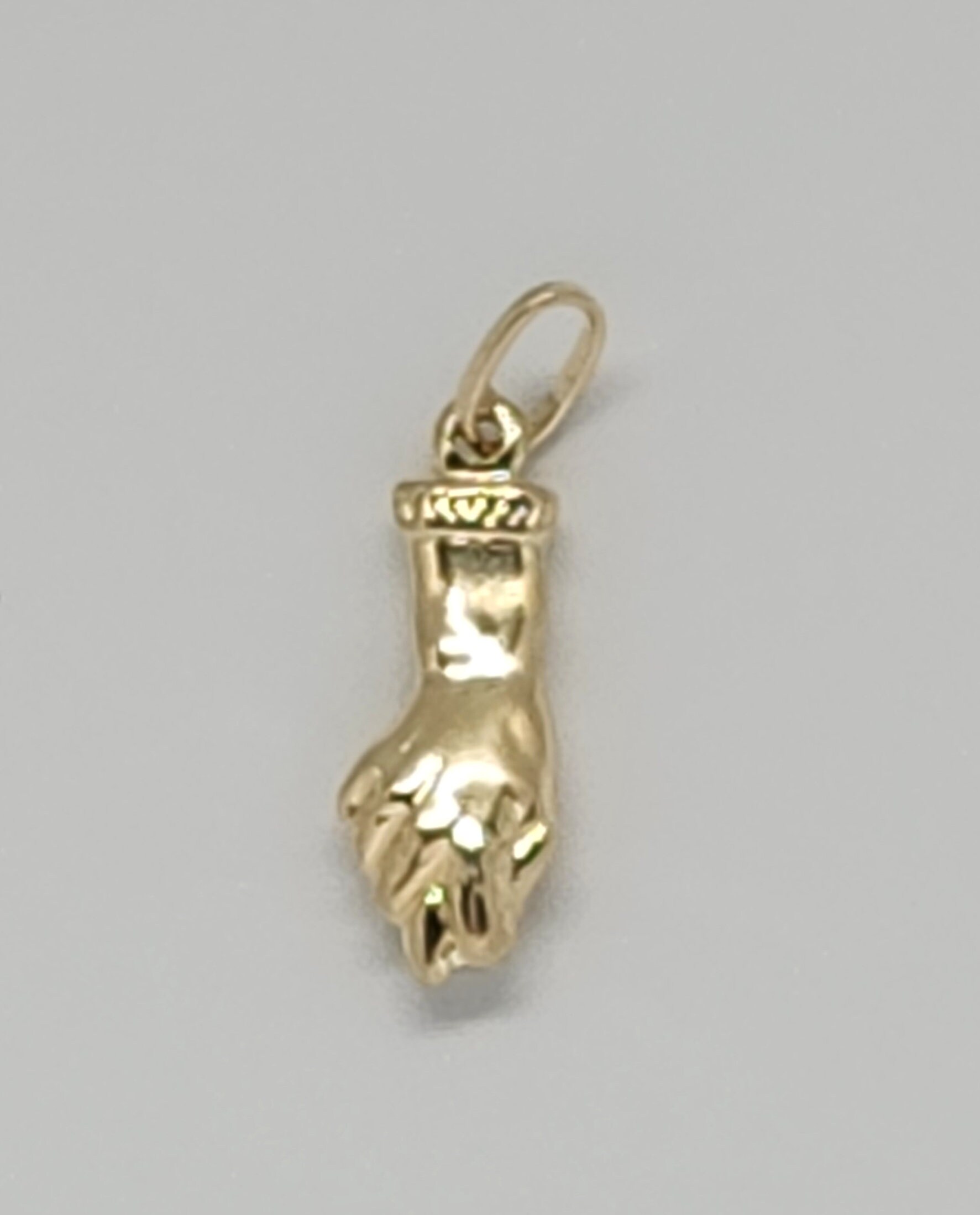 Gold fist pendant deals