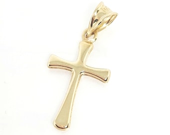 Könnte beinhalten: Ein polierter Goldkreuz-Anhänger mit einer glatten, reflektierenden Oberfläche und leicht ausgestellten Enden an jedem Arm. Der Anhänger verfügt über eine dreieckige Öse an der Oberseite, die zur Befestigung an einer Kette dient.