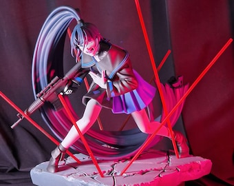 May include: A black-haired anime figurine with a blue and white uniform, holding a rifle, standing on a cracked gray base with red lights shining on it.