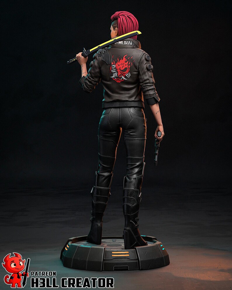May include: A figurine of a character from Cyberpunk 2077, viewed from the back. The figure has red hair and wears a black leather jacket with a red and white design, black pants, and boots. The figure holds a yellow and black sword and a gun.