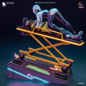 May include: A detailed figurine depicting a futuristic scene. A person in a yellow jacket lies on a stretcher, with another person in a white jacket and black leggings leaning over them. The stretcher is yellow, and the base is purple with neon accents. The image includes text.