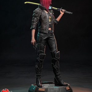 May include: A detailed figurine of a character in a futuristic outfit, holding a glowing yellow and black sword. The figure has red hair and is wearing a black jacket, pants, and boots. The base of the figure has the text "PATREON HELL CREATOR".