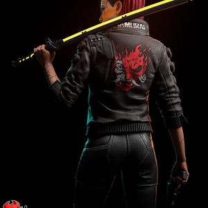 May include: A figure in a black leather jacket with a red and white graphic on the back, holding a yellow and black sword. The jacket has the word "SAMURAI" on the collar. The figure has red hair and black pants. The image is set against a black background.