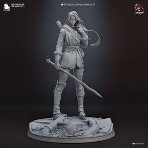 May include: A gray resin miniature figurine of a standing warrior wearing a fur-trimmed jacket, gloves, and tall boots. The figure holds a long sword and stands on a circular base featuring a partially buried figure emerging from cracked ground.