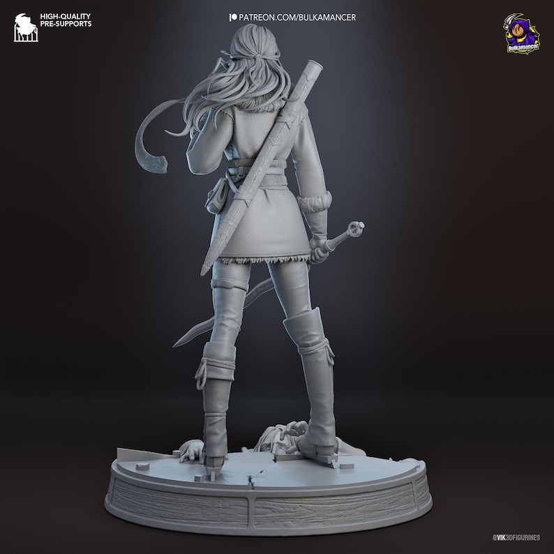 May include: A gray 3D printed resin figurine of a warrior standing on a circular base. The figure has long hair, wears a tunic with fur trim, pants, and tall boots. A sword in a scabbard is strapped to the back, and a hand is held at the side.