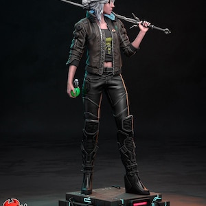 May include: A detailed figurine of a woman with white hair, wearing a brown jacket, black pants, and boots, holding a sword. She also holds a green potion bottle. The figurine stands on a platform with neon blue and red accents. The text "PATREON HELL CREATOR" is at the bottom.