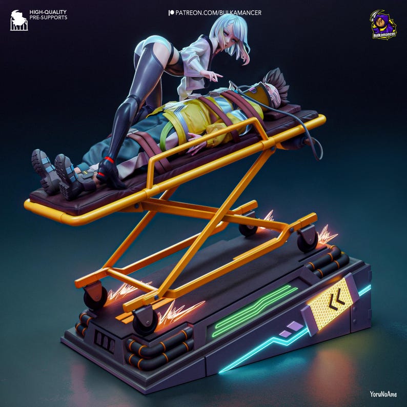 May include: A detailed figurine depicting a person on a stretcher with another person attending. The stretcher is yellow and brown, set on a dark base with neon accents. The attending person wears a white shirt and black leggings.