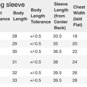 May include: Unisex long sleeve size chart with measurements in inches for body width, chest tolerance, body length, body length tolerance, sleeve length, chest width, body width tolerance, and sleeve tolerance.