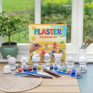 May include: A plaster colouring kit with eight unpainted figurines, paint pots, brushes, and a box with the words "Plaster Colouring Kit" on the front.