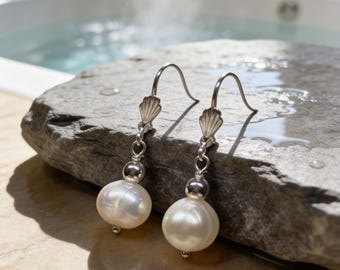 Pearl earrings: Sterling Silver.