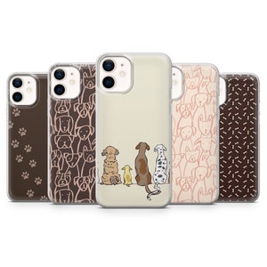 May include: Set of six clear phone cases with different dog-themed designs. One case features a group of dogs sitting in a row, another has a pattern of paw prints, and the others have various dog illustrations.