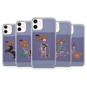 May include: Set of six clear phone cases with a purple background and skeleton illustrations. Each case features a different zodiac sign: Aries, Libra, Virgo, Capricorn, Sagittarius, and Scorpio. The text "The" is printed above each zodiac sign.