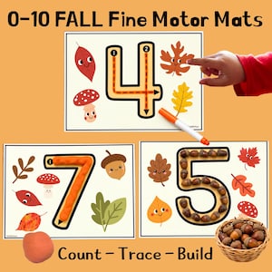 Könnte beinhalten: Pädagogische 0-10 Herbst-Feinmotorik-Matten mit den Zahlen 4, 7 und 5. Jede Matte zeigt eine große Zahl mit herbstlichen Illustrationen wie Blättern, Pilzen und Eicheln. Die Matten sind zum Zählen, Nachspuren und Bauen mit Knete oder Eicheln gedacht, ergänzt durch einen orangefarbenen Stift und einen kleinen Korb mit Eicheln.
