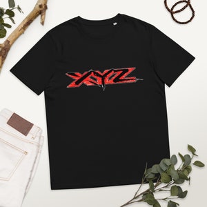 May include: Black t-shirt with a red and black graphic of the word "XYZ" in a stylized font.