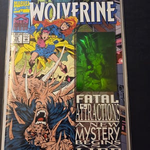 May include: A comic book cover for Wolverine, featuring a dynamic illustration with characters in action. The cover includes the title "Wolverine" and text that reads "Fatal Attractions, A New Mystery Begins, Life Hangs in the Balance!"