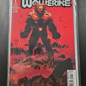 May include: A comic book cover featuring Wolverine, a superhero with sharp claws, standing in a red and black landscape. The cover is titled "Wolverine" and features the number "1" in the top left corner. The comic book is published by Marvel.