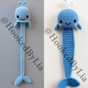 May include: Two crocheted whale bookmarks in blue with white accents. The whale on the left has a simple tail, while the whale on the right has a more detailed tail with a white fin. Both whales have black eyes and a white smile. The text "Whale Style 1" is above the whale on the left, and the text "Whale Style 2" is above the whale on the right. The text "@HookedByLia" is in the bottom right corner of the image.