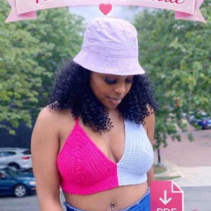 May include: A two-tone crochet bralette in pink and light blue. The image also features a light purple bucket hat and blue jeans. Text on the image reads "CROCHET PATTERN Two-Tone Bralette" and "Instant Download PDF Pattern".