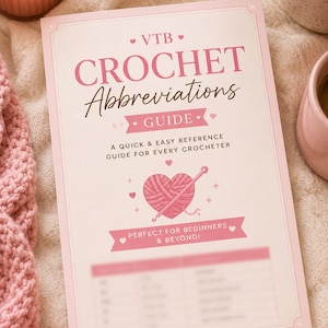 May include: A pink and white crochet abbreviations guide with the text "CROCHET Abbreviations GUIDE". The guide includes a heart-shaped yarn ball and crochet hook graphic. The text "PERFECT FOR BEGINNERS & BEYOND!" is also visible.